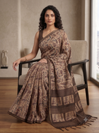 Silk blend saree with tassels - coffee brown printed design - sitting Pose